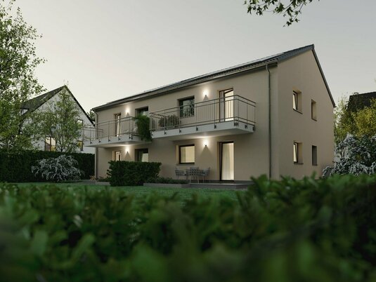 Mehrfamilienhaus Quattro 287, Abendansicht vom Garten, energieeffiziente Massivbauweise, flexibel nutzbare Grundrisse, langlebige und wertbeständige Bauweise für zukunftssichere Anlage.