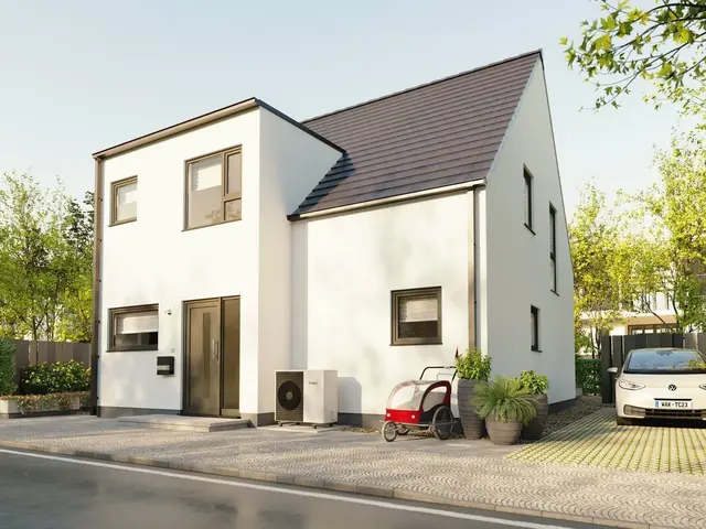Großzügiges Einfamilienhaus mit Panoramaanbau und großen Fensterflächen als Symbol für modernes Wohnen und den Weg ins Eigenheim.